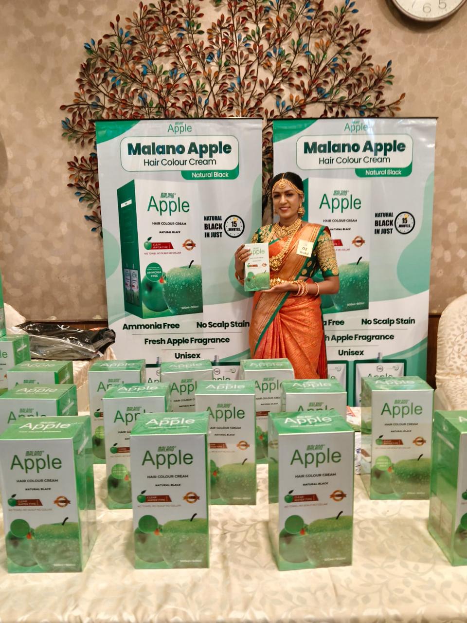 PRIIS exhibition booth with Malano Apple hair colour cream product display