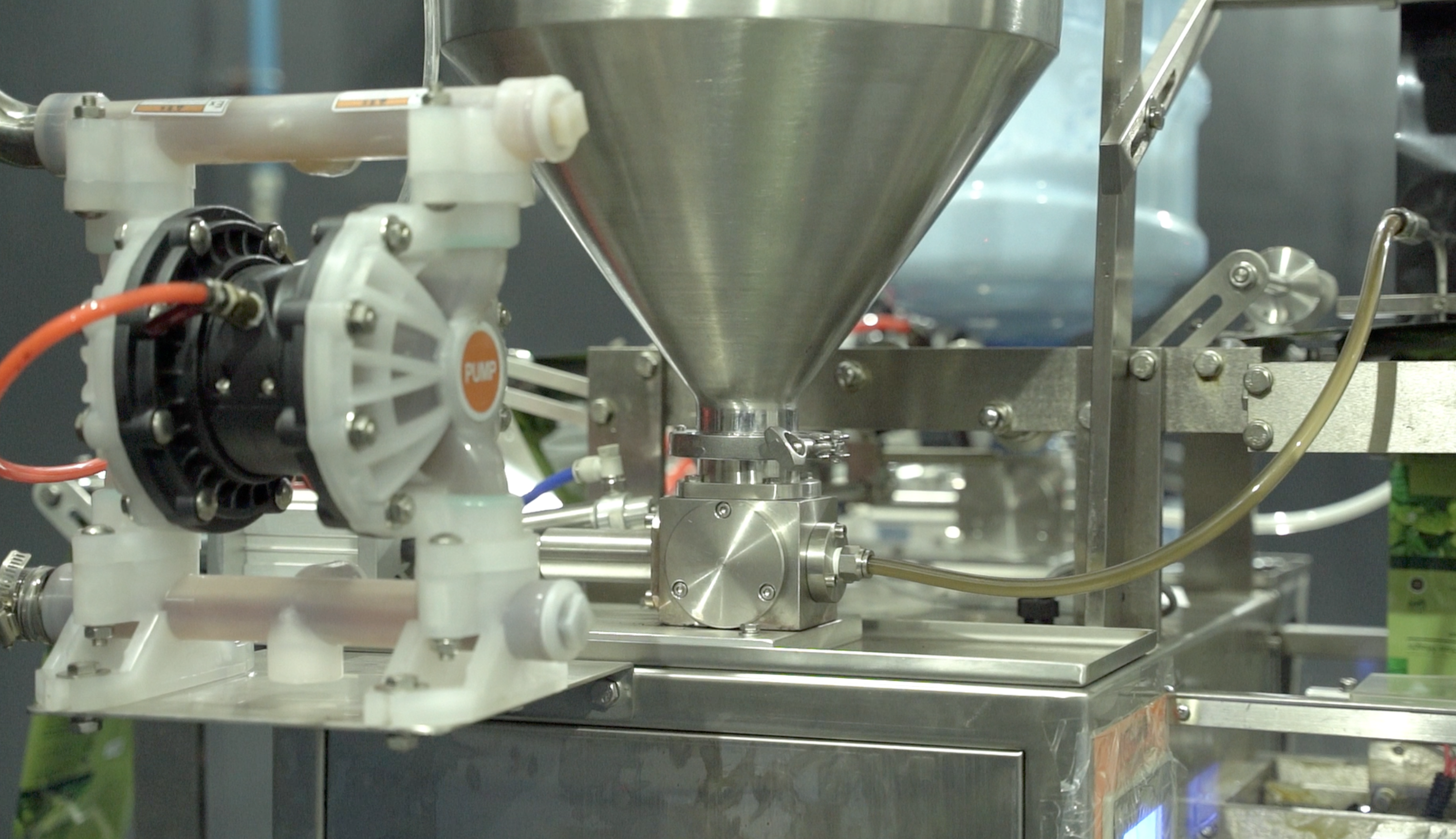 Sachet packing machine angle showing sachet film movement and sealing area